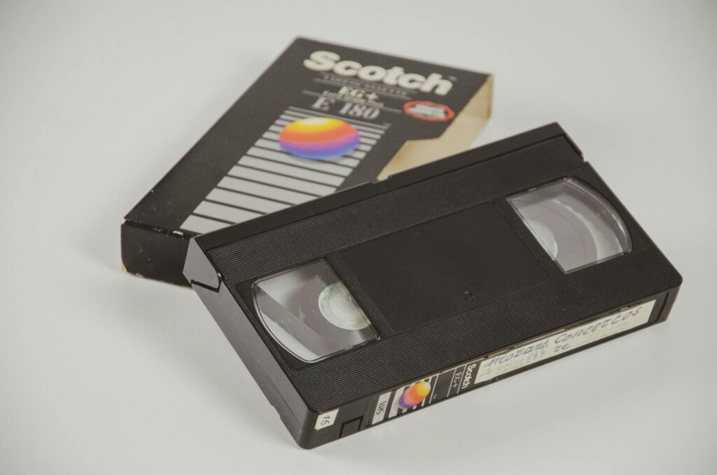 Classic VHS tape and box on a white background, evoking nostalgia and retro vibes.